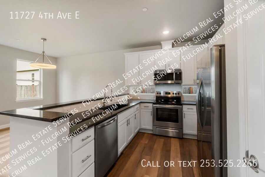 11727 4th Ave E - Photo 6 of 19