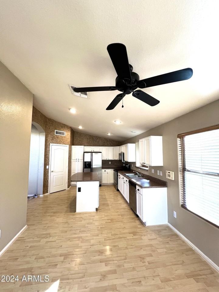 11210 E Pronghorn Ave - Photo 7 of 26