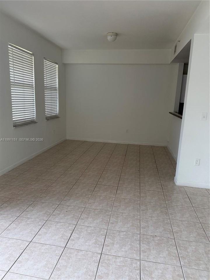 11001 Nw 83rd St #103 - Photo 4 of 12