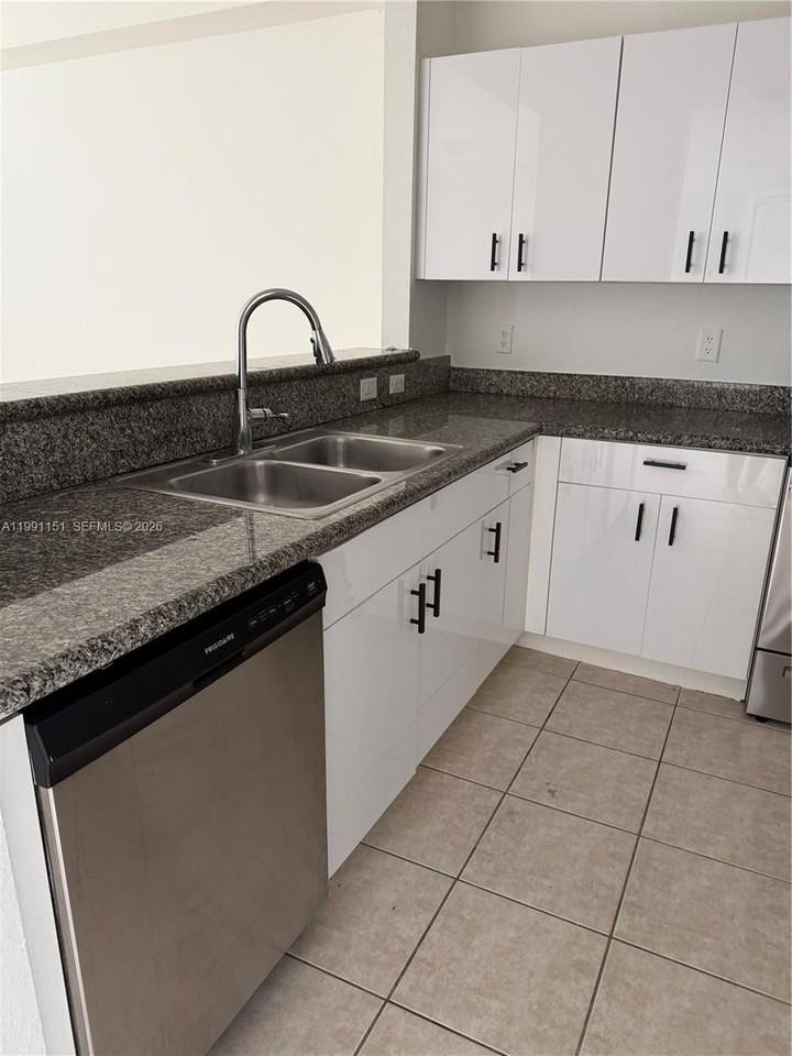 11001 Nw 83rd St #103 - Photo 5 of 12