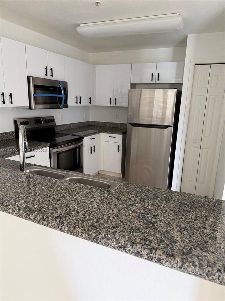 11001 Nw 83rd St #103 - Photo 7 of 12