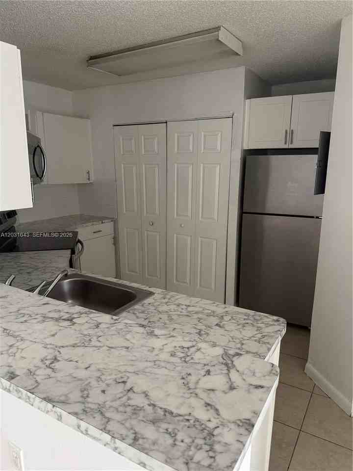 6276 Nw 186th St #311 - Photo 4 of 12