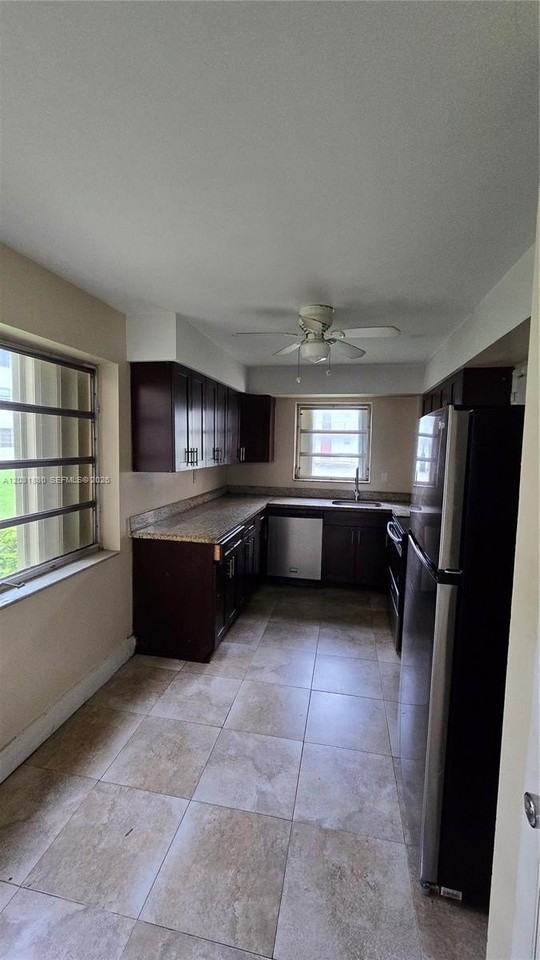1450 Ne 191st St #106 - Photo 4 of 16