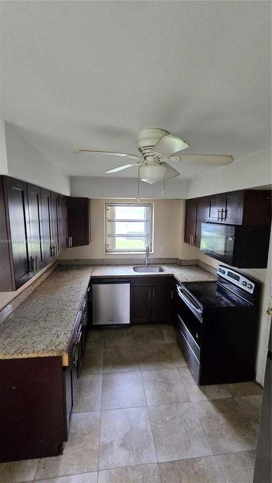1450 Ne 191st St #106 - Photo 5 of 16