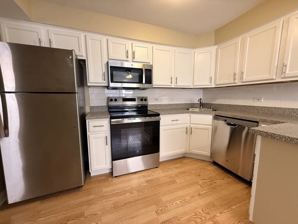 6606 W 64th Pl #1A - Photo 5 of 9