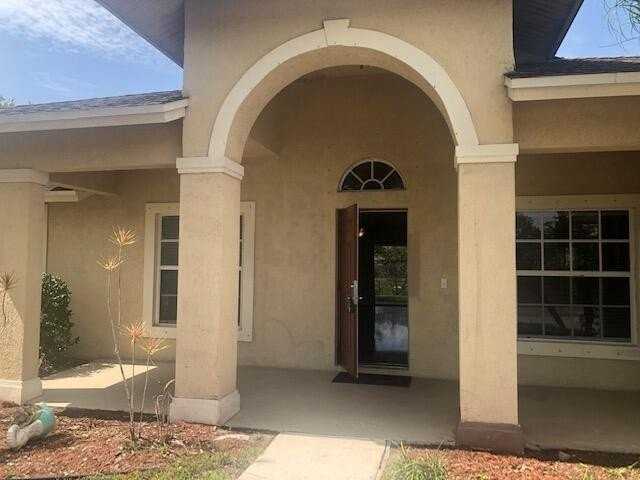 1201 Sw Idol Ave - Photo 2 of 11