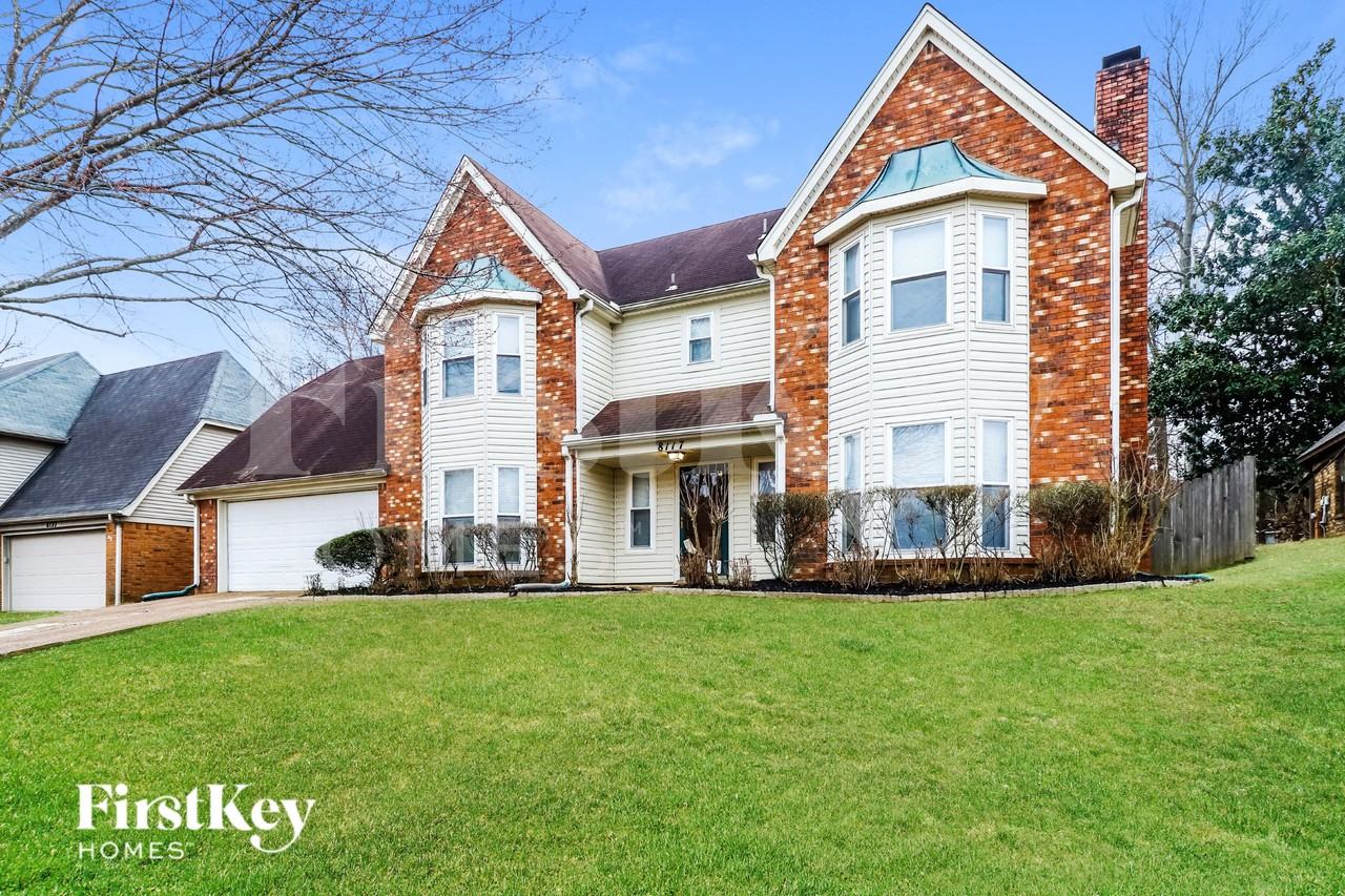8117 S Regis Pl - Photo 2 of 15