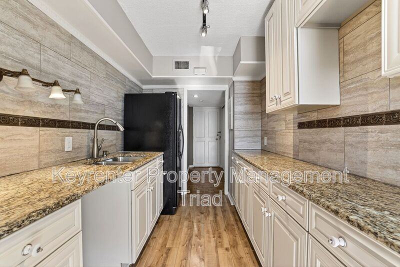 1101 N Elm St #104 - Photo 2 of 37
