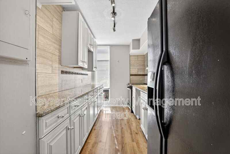 1101 N Elm St #104 - Photo 7 of 37