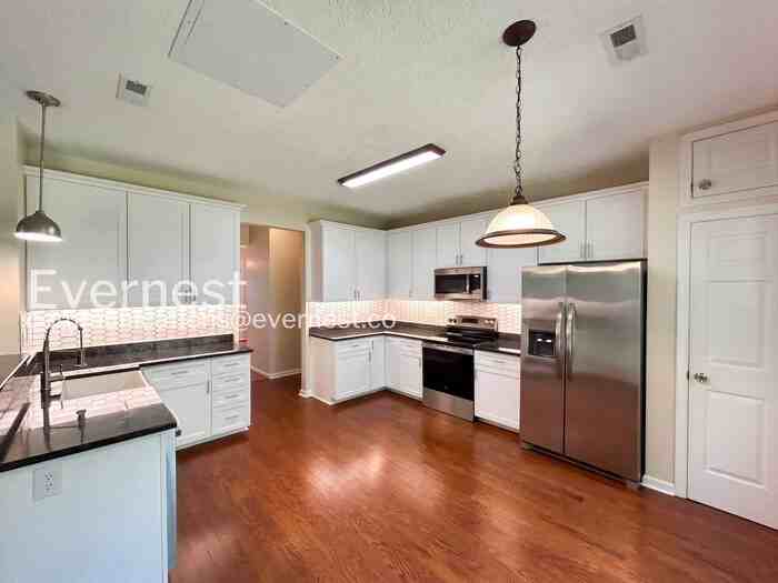 6228 Weathersfield Way - Photo 4 of 27