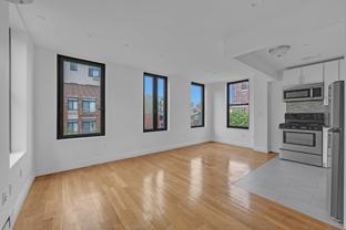 419 E 117th St #PH5 - Photo 1 of 1
