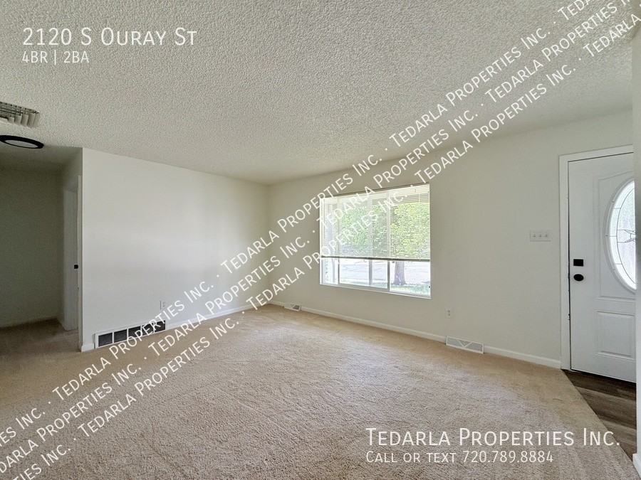 2120 S Ouray St - Photo 3 of 16