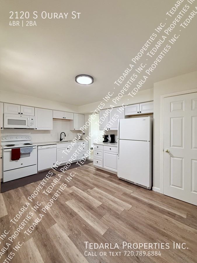 2120 S Ouray St - Photo 4 of 16