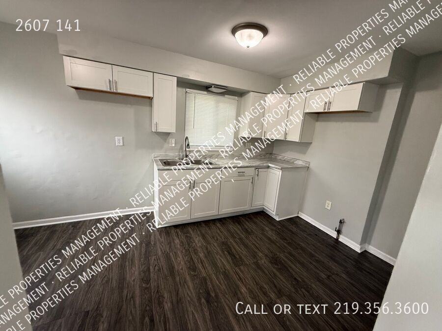 2607 E 141st Pl - Photo 5 of 8