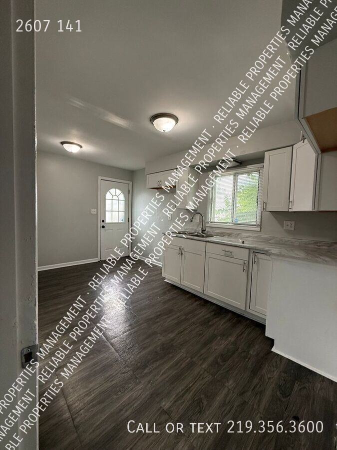 2607 E 141st Pl - Photo 6 of 8