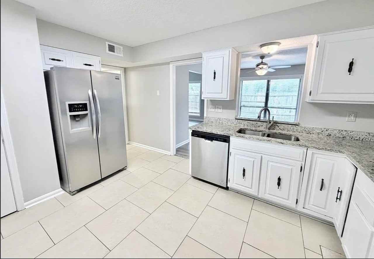 8406 Rockcreek Pkwy - Photo 6 of 23