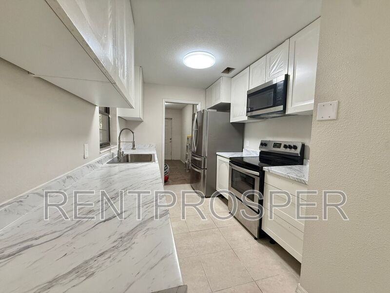 1900 Adair St - Photo 6 of 26