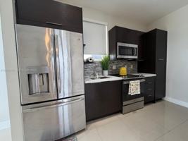 featured image of 6440 Nw 103rd Psge #6440