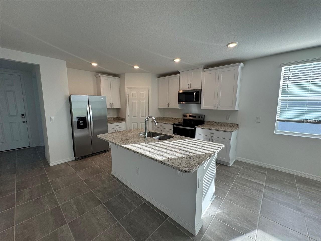 4552 Pickerel Weed Way - Photo 3 of 11