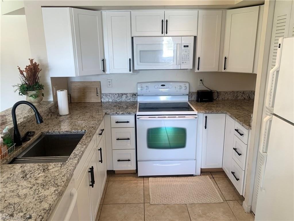 1275 Wildwood Lakes Blvd #2-108 - Photo 6 of 15