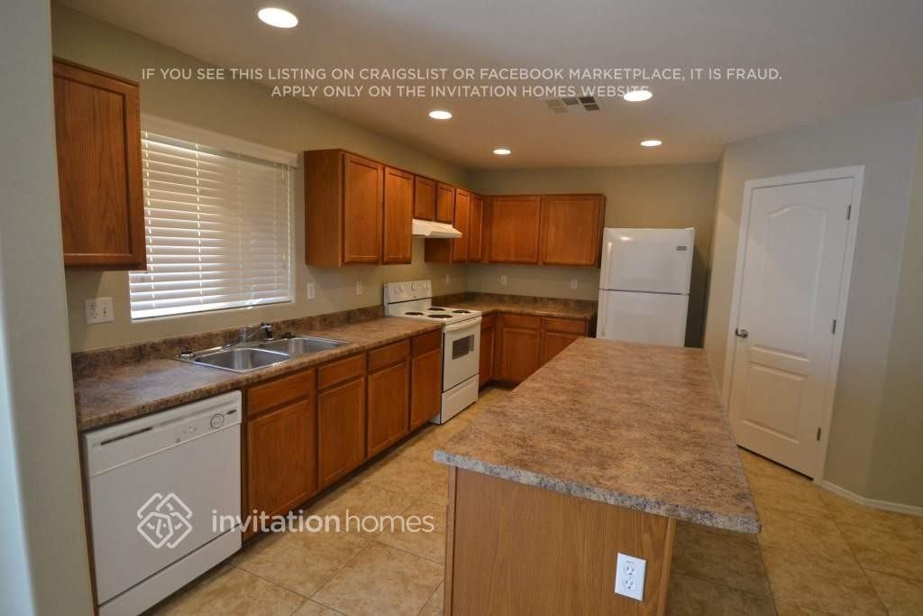 12047 W Salter Dr - Photo 3 of 11