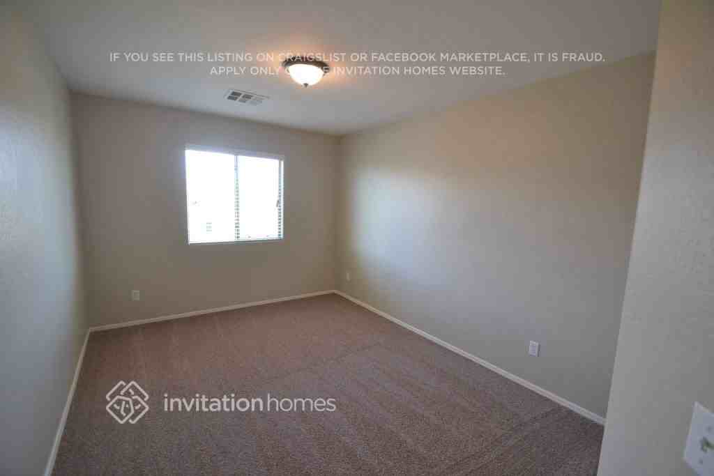 12047 W Salter Dr - Photo 6 of 11
