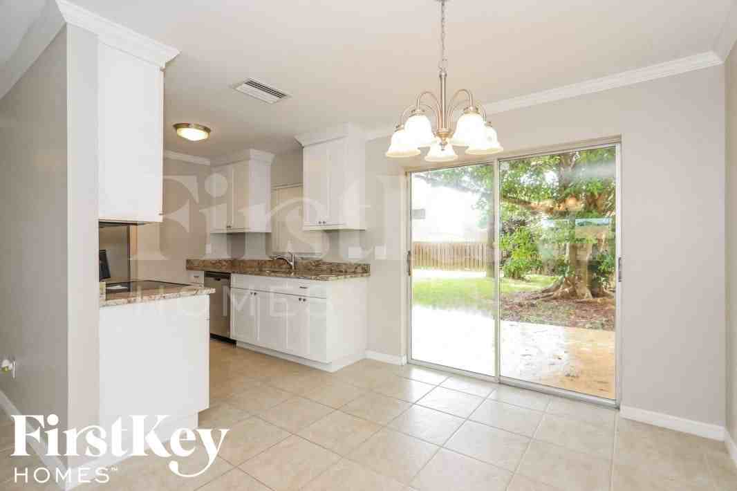 9217 Pomelo Rd E - Photo 6 of 15