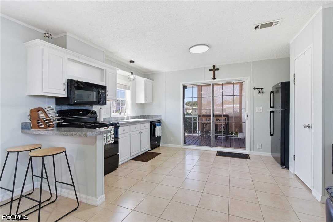 5558 Palm Beach Blvd #105 - Photo 2 of 40