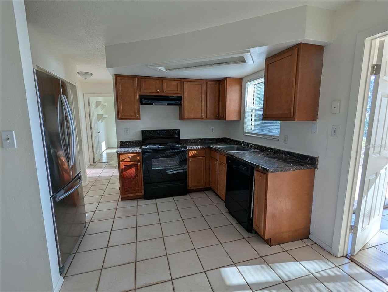 9310 Whitman Ln - Photo 2 of 17