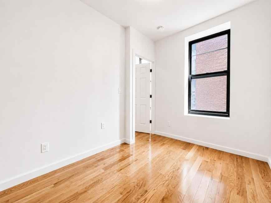 401 E 68th St - Photo 5 of 10
