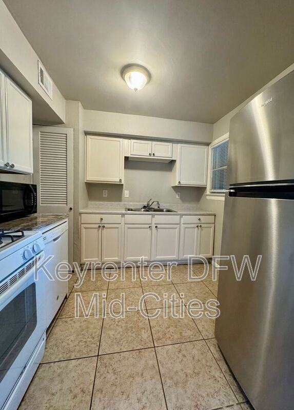 311 N Oak Cliff Blvd - Photo 4 of 13
