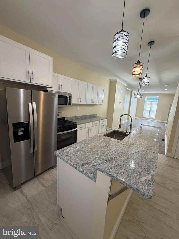 1904 E Lanvale St - Photo 2 of 14
