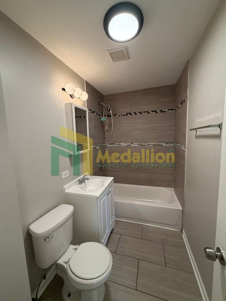 12432 S Lowe Ave - Photo 7 of 11