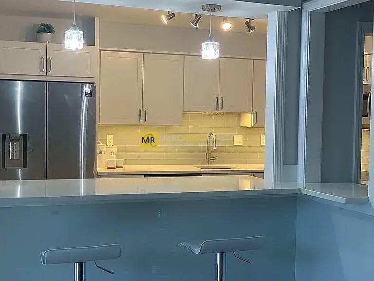 Hammond Pond Pkwy #206 - Photo 6 of 21