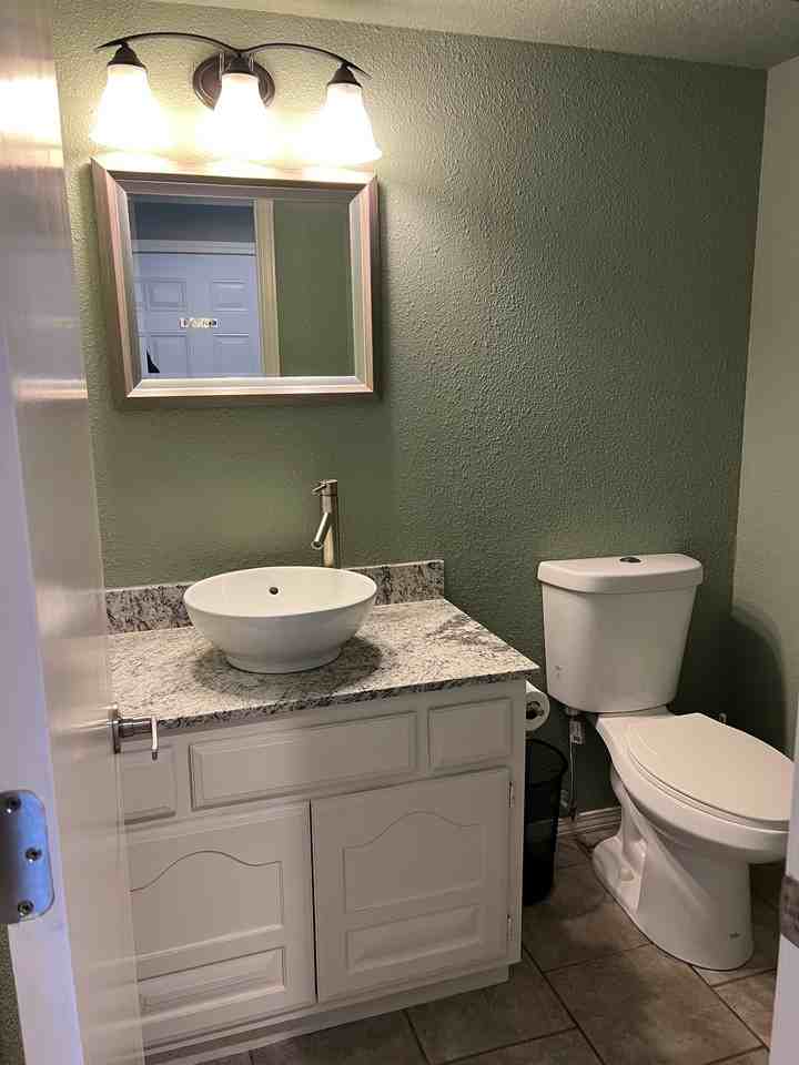 7129 S Braden Ave - Photo 7 of 15
