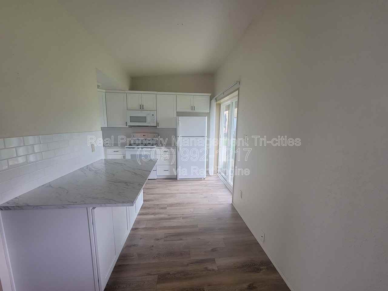 1101 W Margaret St #1115B - Photo 2 of 6