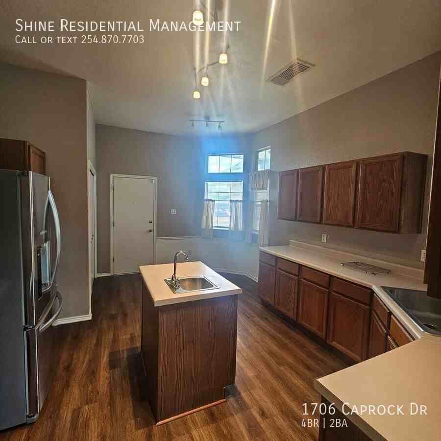 1706 Caprock Dr - Photo 5 of 12
