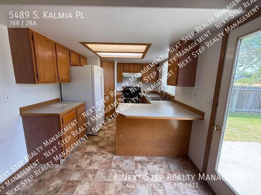 5489 S Kalmia Pl - Photo 4 of 18