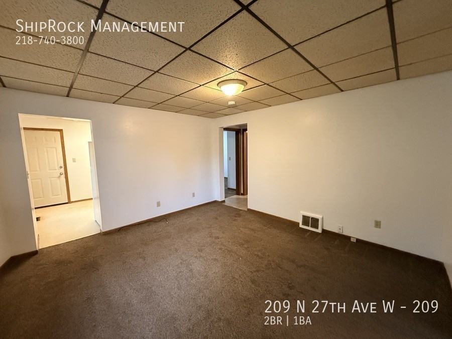 209 N 27th Ave W #209 - Photo 2 of 11
