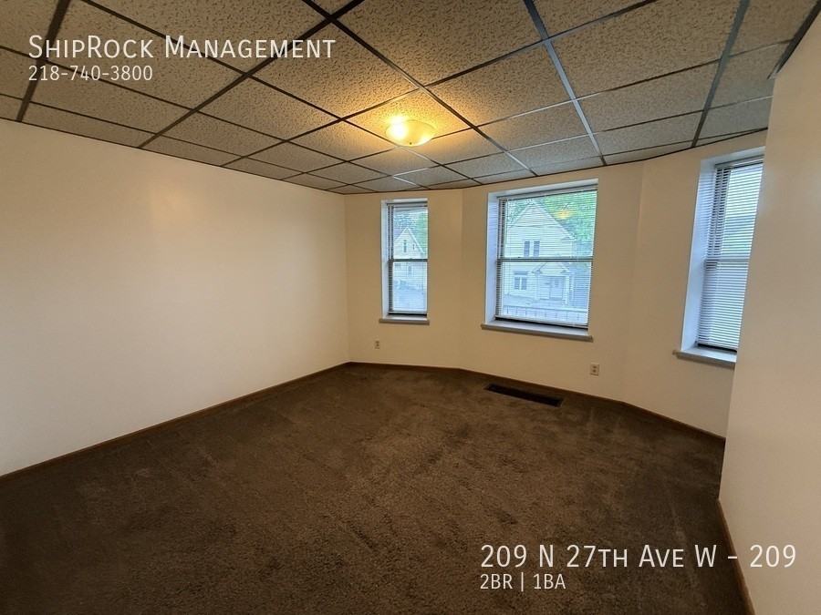 209 N 27th Ave W #209 - Photo 3 of 11