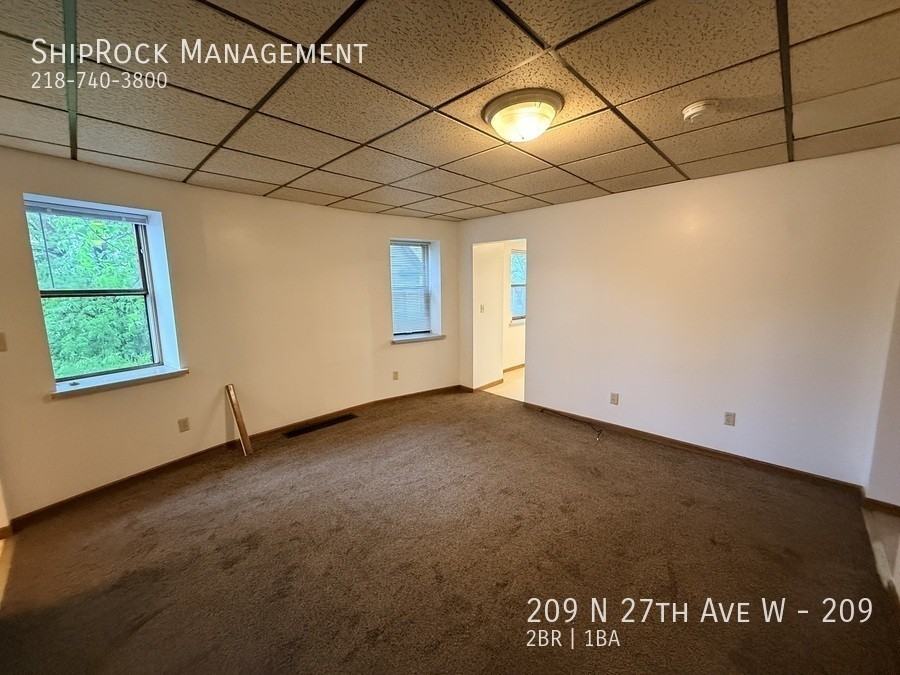 209 N 27th Ave W #209 - Photo 4 of 11
