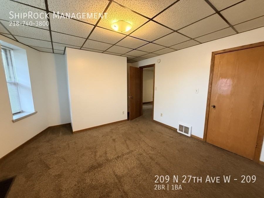 209 N 27th Ave W #209 - Photo 5 of 11