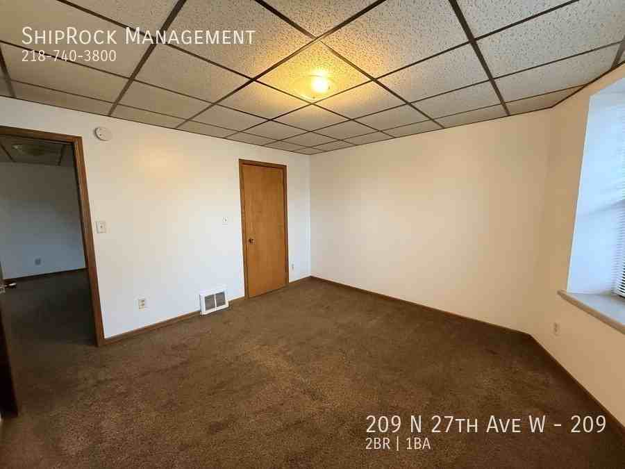209 N 27th Ave W #209 - Photo 6 of 11