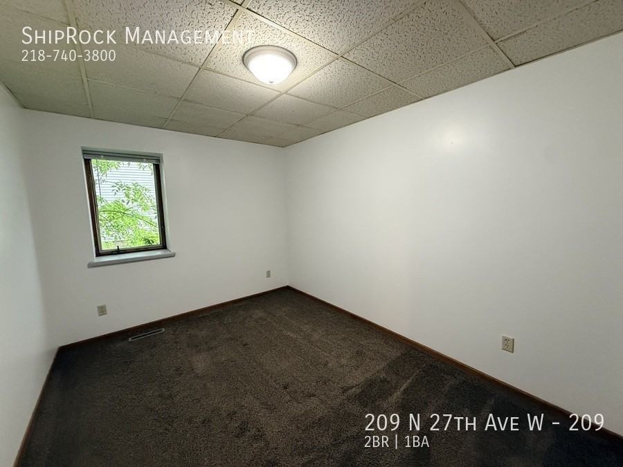 209 N 27th Ave W #209 - Photo 7 of 11
