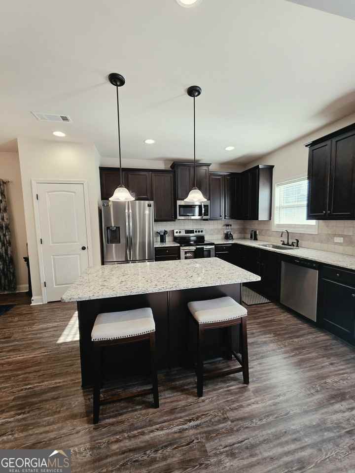 9025 Holder Rd - Photo 4 of 15
