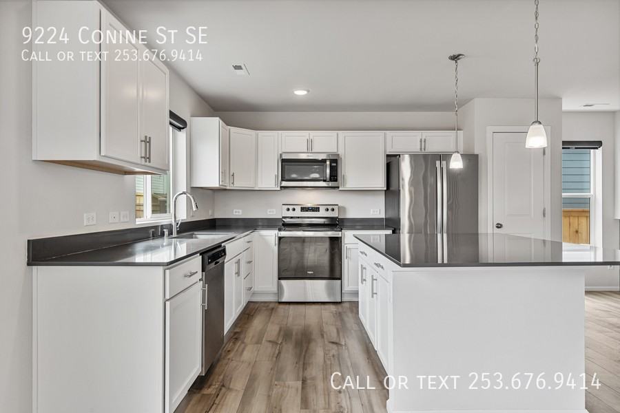 9224 Conine St Se - Photo 2 of 28