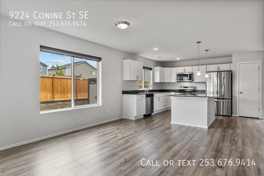 9224 Conine St Se - Photo 3 of 28