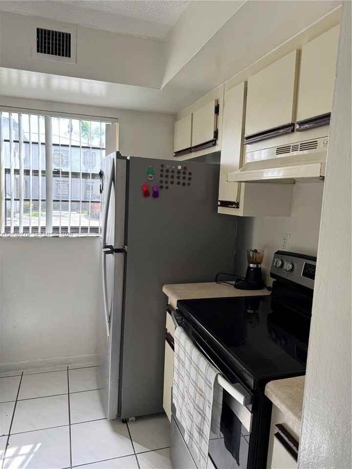 18250 Mediterranean Blvd #2-15 - Photo 3 of 13