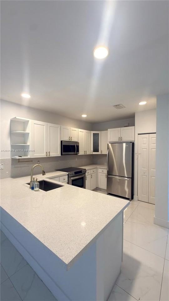10737 Nw 76th Ln #0 - Photo 7 of 27