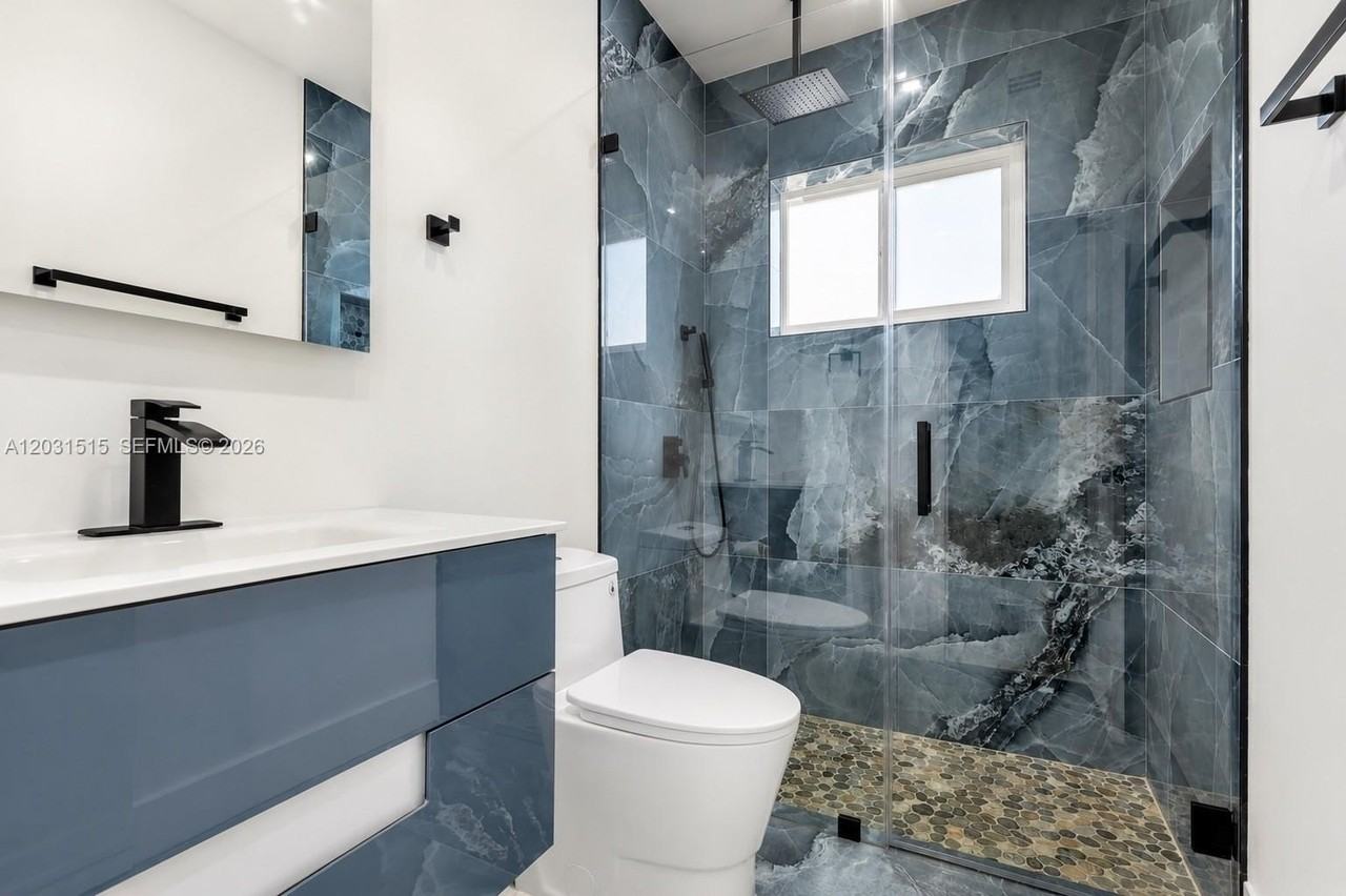 8819 Dickens Ave - Photo 3 of 29